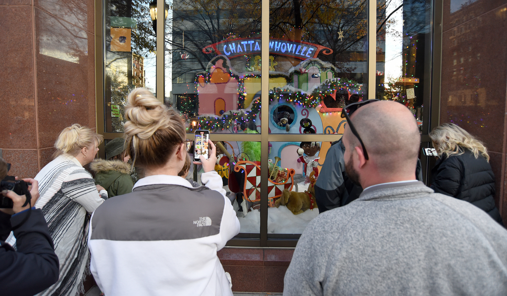 Staff Photo by Matt Hamilton / Visitors look over the scenes through the windows at EPB headquarters on Wednesday, November 24, 2021.