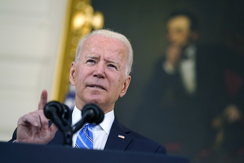 Photo by Andrew Harnik of The Associated Press / President Joe Biden speaks about the economy and his infrastructure agenda in the State Dining Room of the White House on July 19, 2021.