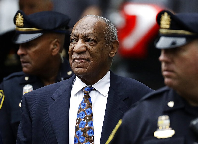 Bill Cosby arrives for his sentencing hearing at the Montgomery County Courthouse, Monday, Sept. 24, 2018, in Norristown, Pa. Prosecutors asked the U.S. Supreme Court to review the decision that overturned Cosby's conviction. In a petition filed Monday, Nov. 29, 2021 they wrote that courts should not equate a supposed promise made by a former prosecutor to lifetime immunity. (AP Photo/Matt Slocum, File)