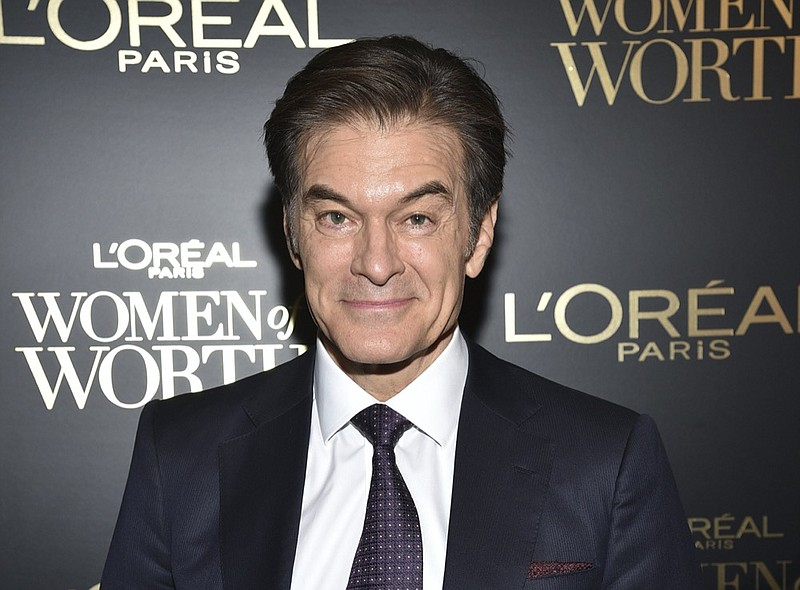 FILE - This Dec. 4, 2019 file photo shows Dr. Mehmet Oz at the 14th annual L'Oreal Paris Women of Worth Gala in New York. (Photo by Evan Agostini/Invision/AP, File)


