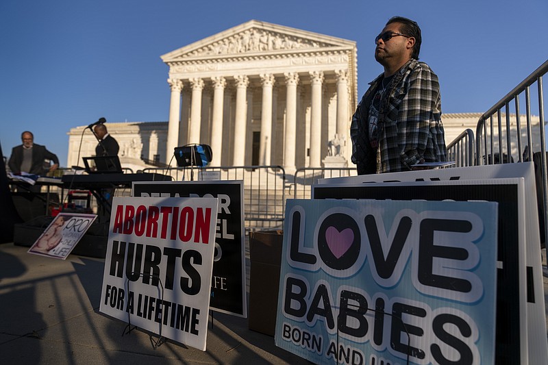 AP Photo/Andrew Harnik / People gather at an anti-abortion rally outside of the Supreme Court in Washington, D.C., Tuesday as activists begin to arrive ahead of the court's arguments on abortion.