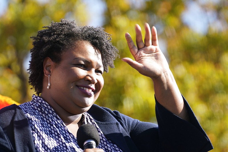 In this Monday, Nov. 2, 2020, file photo, Stacey Abrams speaks to Biden supporters as they wait for former President Barack Obama to arrive and speak at a campaign rally for Biden at Turner Field in Atlanta. (AP Photo/Brynn Anderson, File)