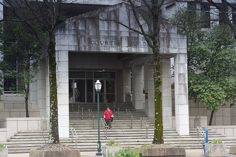 Staff file photo / One person exits the Hamilton County-Chattanooga Courts Building in 2016.