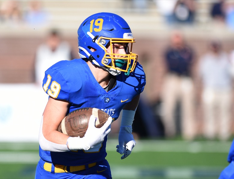Staff Photo by Matt Hamilton / Donelson Christian Academy (19) Dayton Sneed returns a kickoff for a long gain to start the game on Thursday, December 2, 2021 at Finley Stadium. Nashville Christian School and Donelson Christian Academy played in the Division II Class A state championship game Thursday.