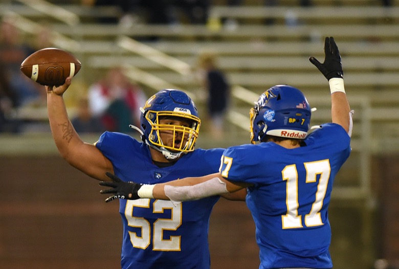 Staff Photo by Matt Hamilton / Donelson Christian Academy (52) LJ Tolbert celebrates with (17) Stephen Altom after recovering a fumble for a turnover on Thursday, December 2, 2021 at Finley Stadium. Nashville Christian School and Donelson Christian Academy played in the Division II Class A state championship game Thursday.