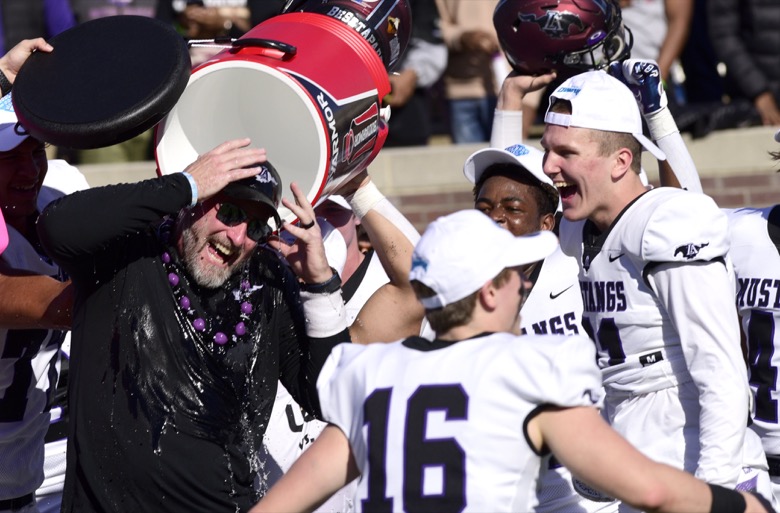 Staff Photo by Robin Rudd / Lipscomb's head coach Trent Dilfer gets the ice buckets emptied on him after the win. The Lipscomb Academy Mustangs defeated the Christ Presbyterian Academy Lions 27 to 0 to win the TSSAA Division II Class AA state football championship in the BlueCross Bowl held at Finley Stadium.