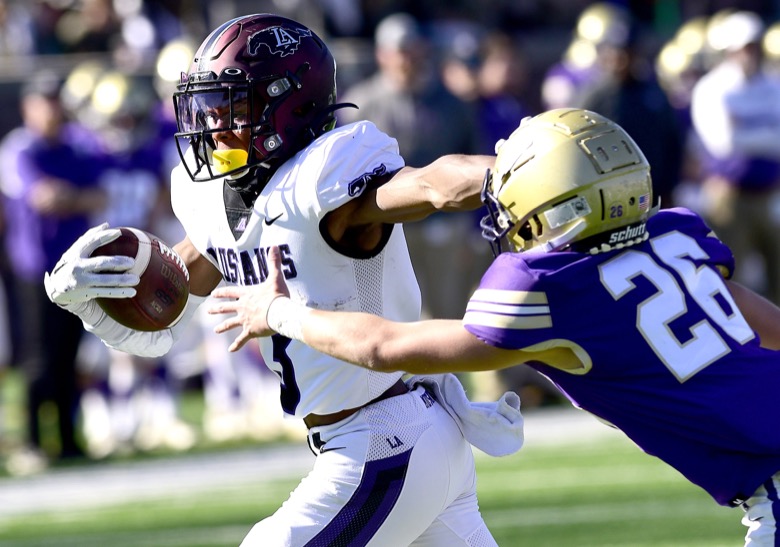 Staff Photo by Robin Rudd / Lipscomb's Maureice Sherrill (3) gets by a CPA defender to score. The Lipscomb Academy Mustangs defeated the Christ Presbyterian Academy Lions 27 to 0 to win the TSSAA Division II Class AA state football championship in the BlueCross Bowl held at Finley Stadium.