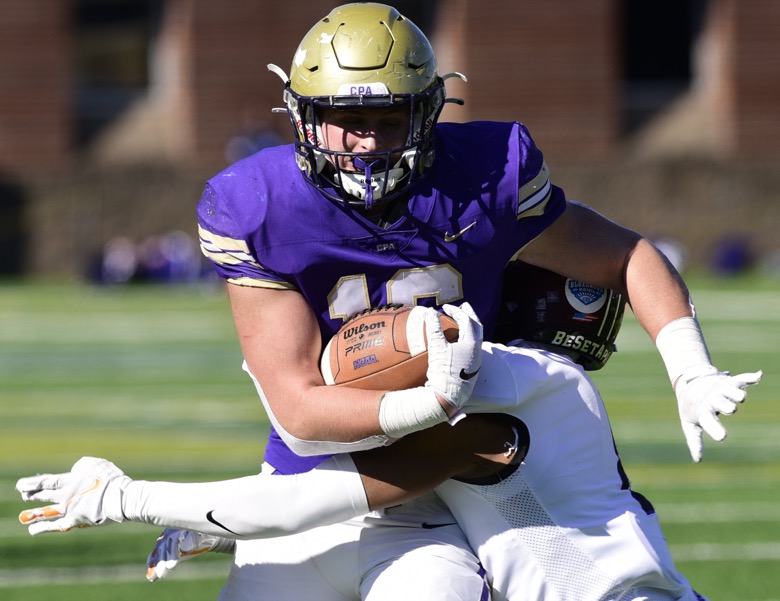 0Staff Photo by Robin Rudd / Bo Burklow (16) gains yards for CPA after a reception. The Lipscomb Academy Mustangs defeated the Christ Presbyterian Academy Lions 27 to 0 to win the TSSAA Division II Class AA state football championship in the BlueCross Bowl held at Finley Stadium.