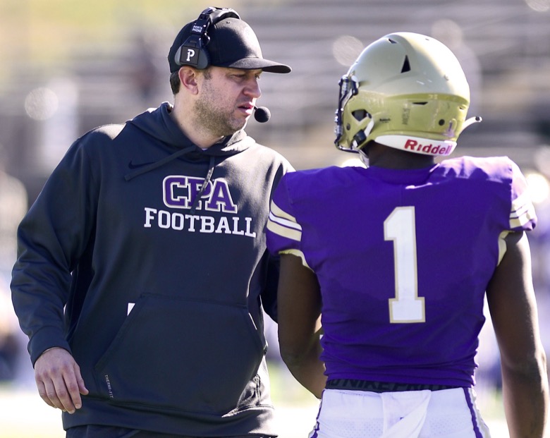 Staff Photo by Robin Rudd / CPA head coach Ingle Martin confers with Caleb Wilson (1). The Lipscomb Academy Mustangs defeated the Christ Presbyterian Academy Lions 27 to 0 to win the TSSAA Division II Class AA state football championship in the BlueCross Bowl held at Finley Stadium.