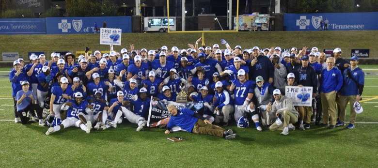 Staff Photo by Matt Hamilton / McCallie School players pose for a group photo after winning the state championship on Thursday, December 2, 2021 at Finley Stadium. McCallie School played Montgomery Bell Academy in the Division II Class AAA State Football Playoffs on Thursday.