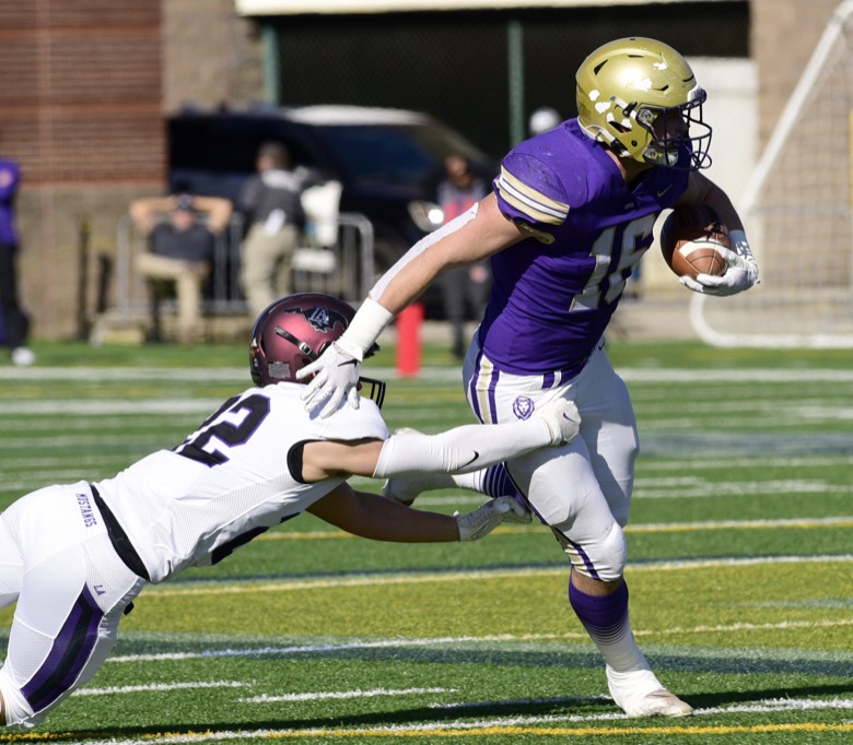Staff Photo by Robin Rudd / CPA's Bo Burklow (16) breaks a tackle after a reception. The Lipscomb Academy Mustangs defeated the Christ Presbyterian Academy Lions 27 to 0 to win the TSSAA Division II Class AA state football championship in the BlueCross Bowl held at Finley Stadium.