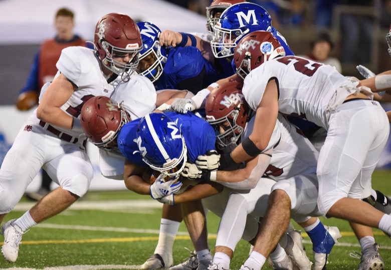 Staff Photo by Matt Hamilton / McCallie School (21) Damian Scott powers into the end zone for a touchdown on Thursday, December 2, 2021 at Finley Stadium. McCallie School played Montgomery Bell Academy in the Division II Class AAA State Football Playoffs on Thursday.