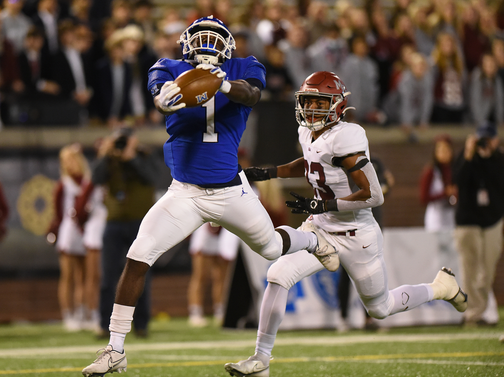 Staff photo by Matt Hamilton / McCallie's Kenzy Paul catches a pass for a touchdown during the TSSAA Division II-AAA BlueCross Bowl on Thursday night at Finley Stadium.