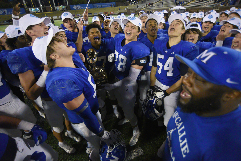 Staff Photo by Matt Hamilton / McCallie School players celebrate after winning the state championship on Thursday, December 2, 2021 at Finley Stadium. McCallie School played Montgomery Bell Academy in the Division II Class AAA State Football Playoffs on Thursday.
