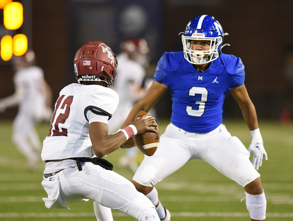 Staff Photo by Matt Hamilton / McCallie School (3) Andrei Delinois gets in the face of Montgomery Bell Academy (12) Marcel Reed on Thursday, December 2, 2021 at Finley Stadium. McCallie School played Montgomery Bell Academy in the Division II Class AAA State Football Playoffs on Thursday.