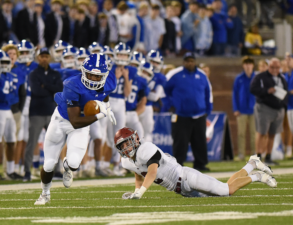 Staff Photo by Matt Hamilton / McCallie School (1) Kenzy Paul carries the ball on Thursday, December 2, 2021 at Finley Stadium. McCallie School played Montgomery Bell Academy in the Division II Class AAA State Football Playoffs on Thursday.