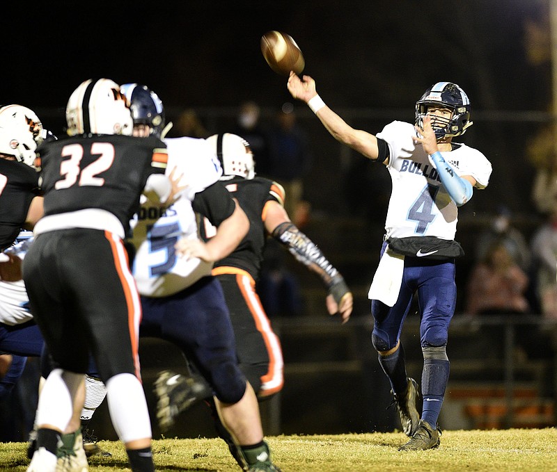 Staff photo by Robin Rudd / Hampton quarterback Conor Jones passes during a game at Meigs County in the second round of the TSSAA Class 2A playoffs in November 2020.