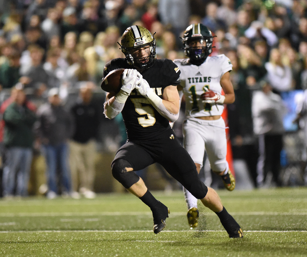 Staff Photo by Matt Hamilton / Calhoun High (5) Cole Speer beats his defender, catches a pass and scores a touchdown on Friday, December 3, 2021 in Calhoun, Ga. Calhoun High hosted Blessed Trinity in a GHSA Class 5A football semifinal game Friday.