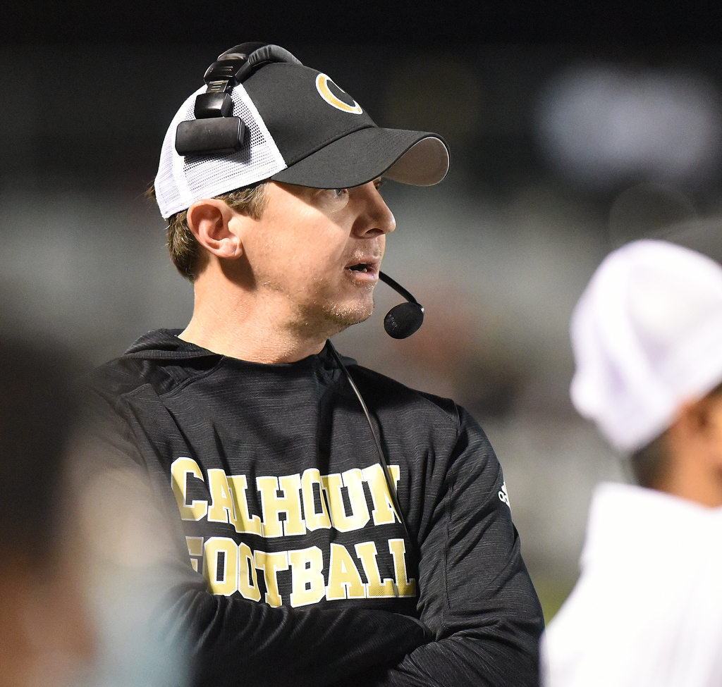 Staff Photo by Matt Hamilton / Calhoun High coach Clay Stephenson watches his team hold Blessed Trinity scoreless in first half action on Friday, December 3, 2021 in Calhoun, Ga. Calhoun High hosted Blessed Trinity in a GHSA Class 5A football semifinal game Friday.