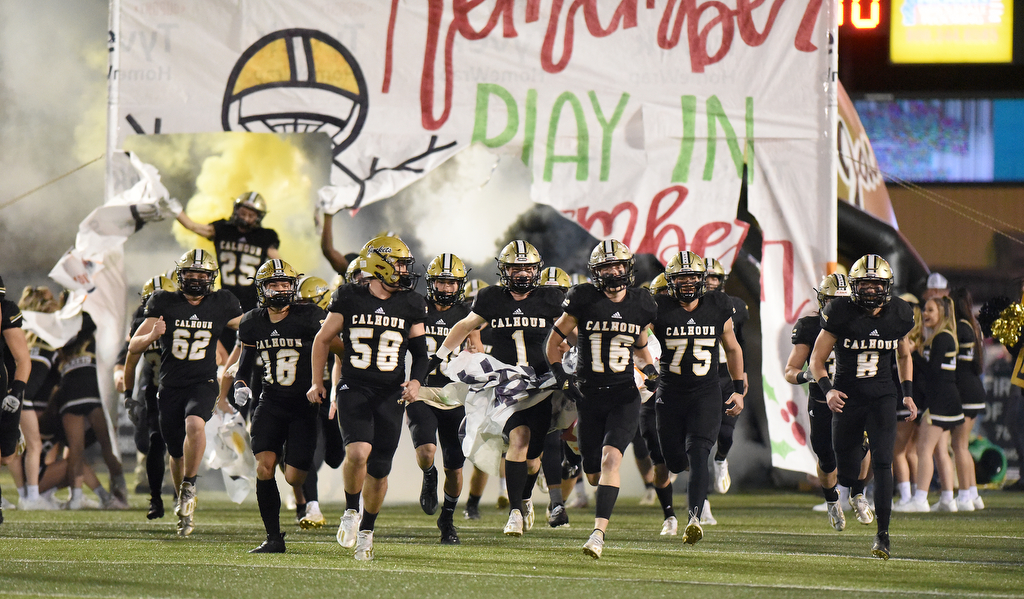 Staff Photo by Matt Hamilton / Calhoun High players take the field on Friday, December 3, 2021 in Calhoun, Ga. Calhoun High hosted Blessed Trinity in a GHSA Class 5A football semifinal game Friday.