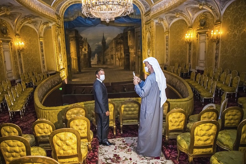 FILE - France's President Emmanuel Macron, left, and the Crown Prince of the Emirate of Abu Dhabi, Sheikh Mohammed bin Zayed Al Nahyan, visit the Imperial Theatre of the Chateau of Fontainebleau, in Fontainebleau, south of Paris, France, Wednesday, Sept. 15, 2021. (Ian Langson/Pool Photo via AP, File)


