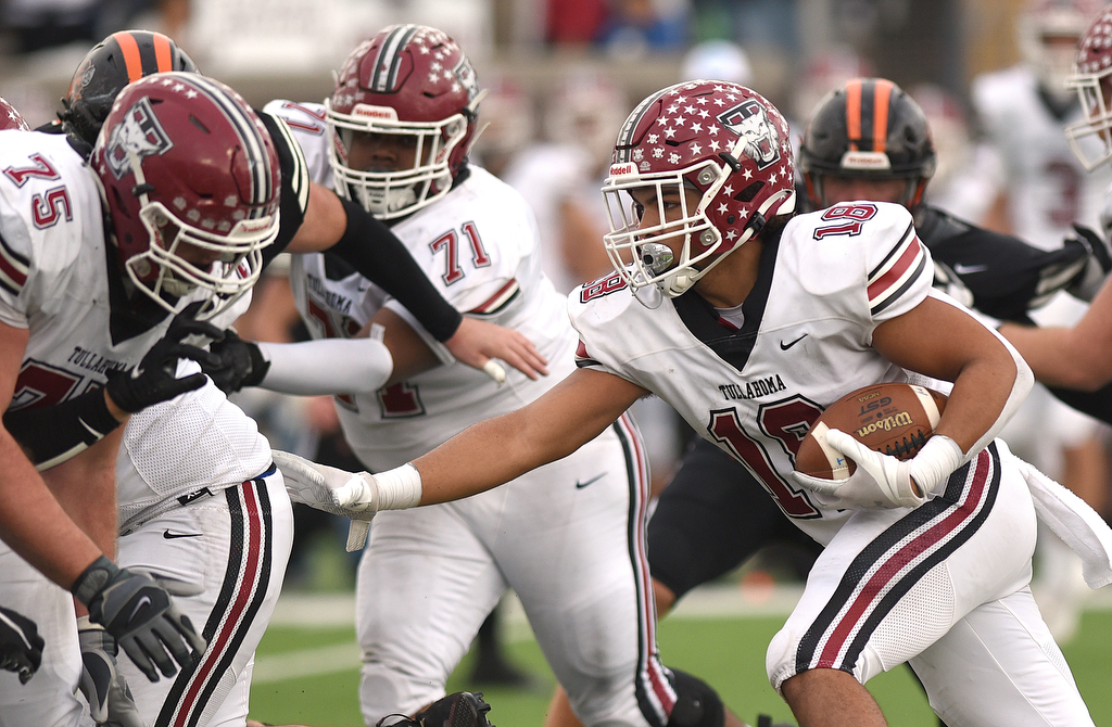Staff Photo by Matt Hamilton / Tullahoma High (18) Keishawn Cummings carries the ball on Saturday, December 4, 2021 at Finley Stadium during the Class 4A championship game. Tullahoma High defeated Elizabethton 21-14 in double overtime.