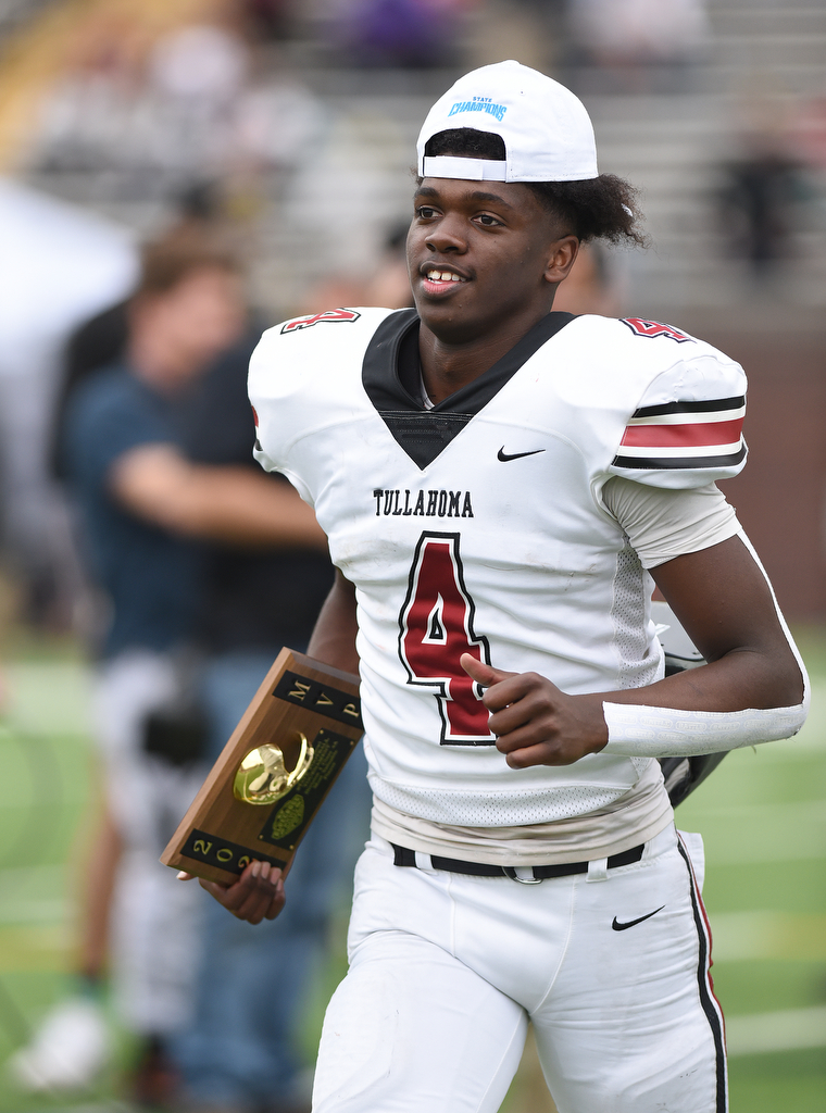 Staff Photo by Matt Hamilton / Tullahoma High (4) Ryan Scott runs back to his team after picking up his MVP plaque on Saturday, December 4, 2021 at Finley Stadium during the Class 4A championship game. Tullahoma High defeated Elizabethton 21-14 in double overtime.