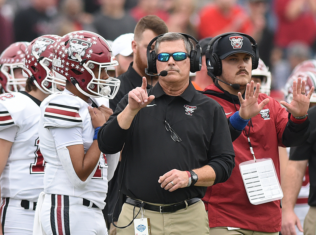 Staff photo by Matt Hamilton / Tullahoma football coach John Olive calls a play during the TSSAA Class 4A BlueCross Bowl against Elizabethton on Saturday at Finley Stadium. Olive's Wildcats won 21-14 in double overtime for the program's first state title in its 100th season.