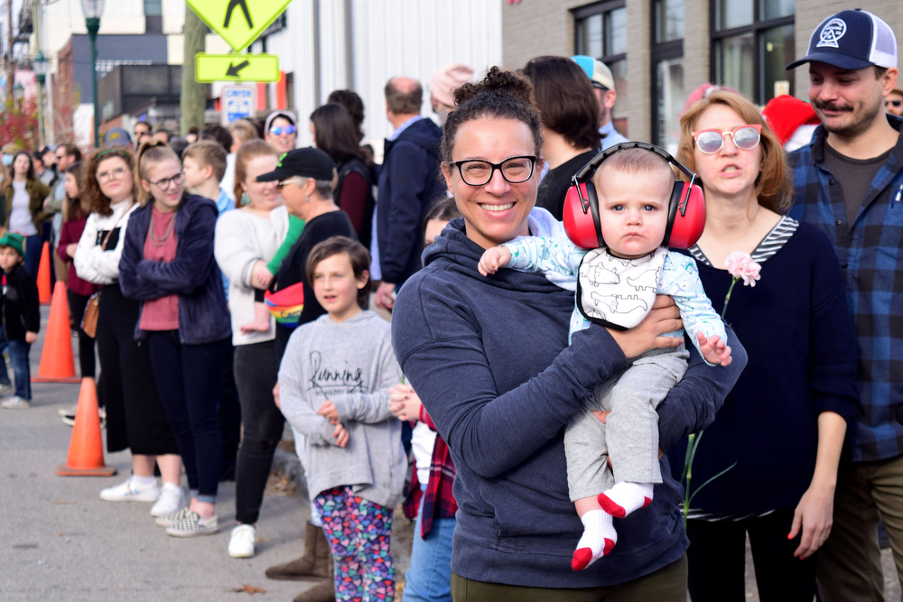 Staff Photo by Robin Rudd / People line Main Street to view the parade. The 15th annual MAINx24 EPB Southside Parade and street festival took place on December 4, 2021.