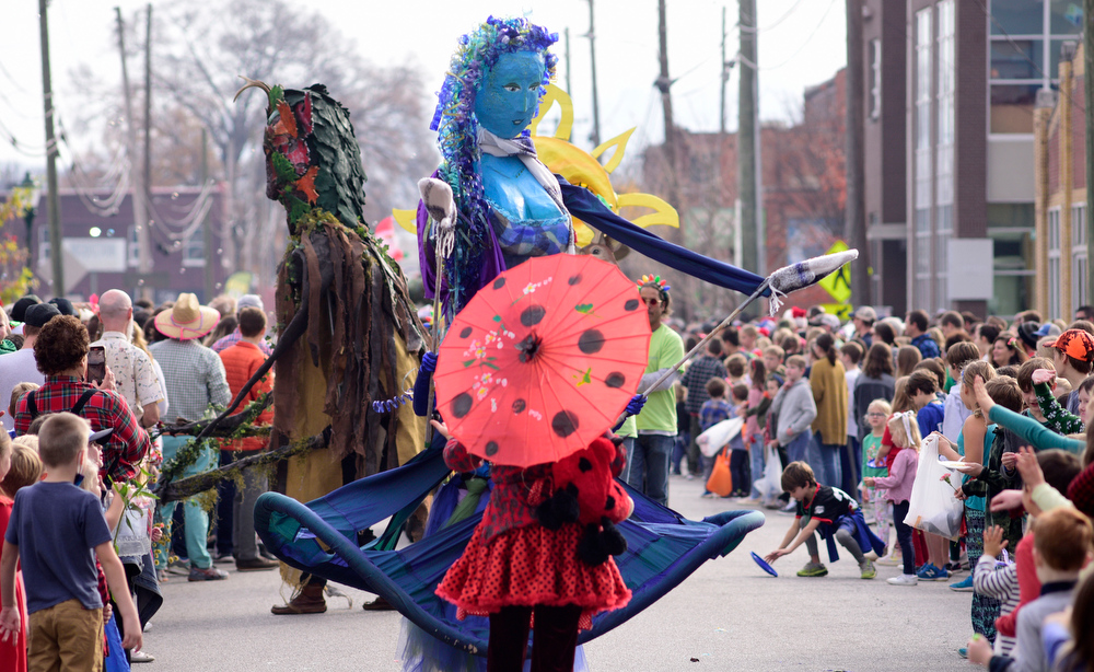 Staff Photo by Robin Rudd / Playful Evolving Monster's the Green Man and the Water Goddess delighted the crowd along Main Street. The 15th annual MAINx24 EPB Southside Parade and street festival took place on December 4, 2021.