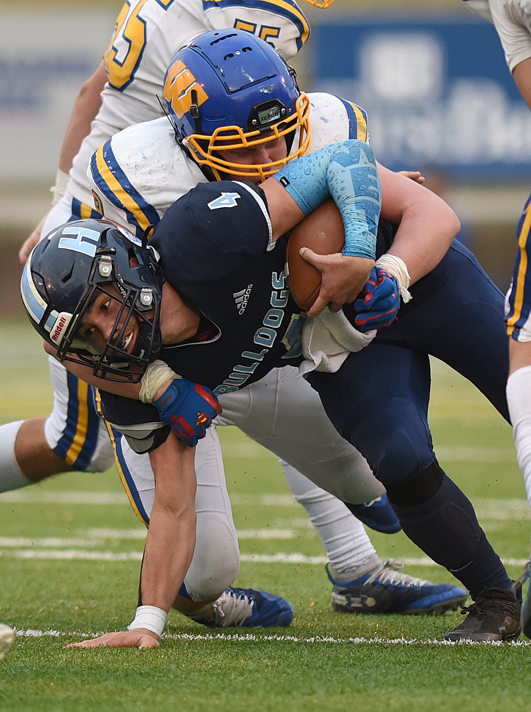 Staff Photo by Matt Hamilton / Hampton High School (4) Conor Jones pushes for more yards on Saturday, December 4, 2021 at Finley Stadium during the Class 2A championship game. Westview defeated Hampton 55-14 in the championship game.