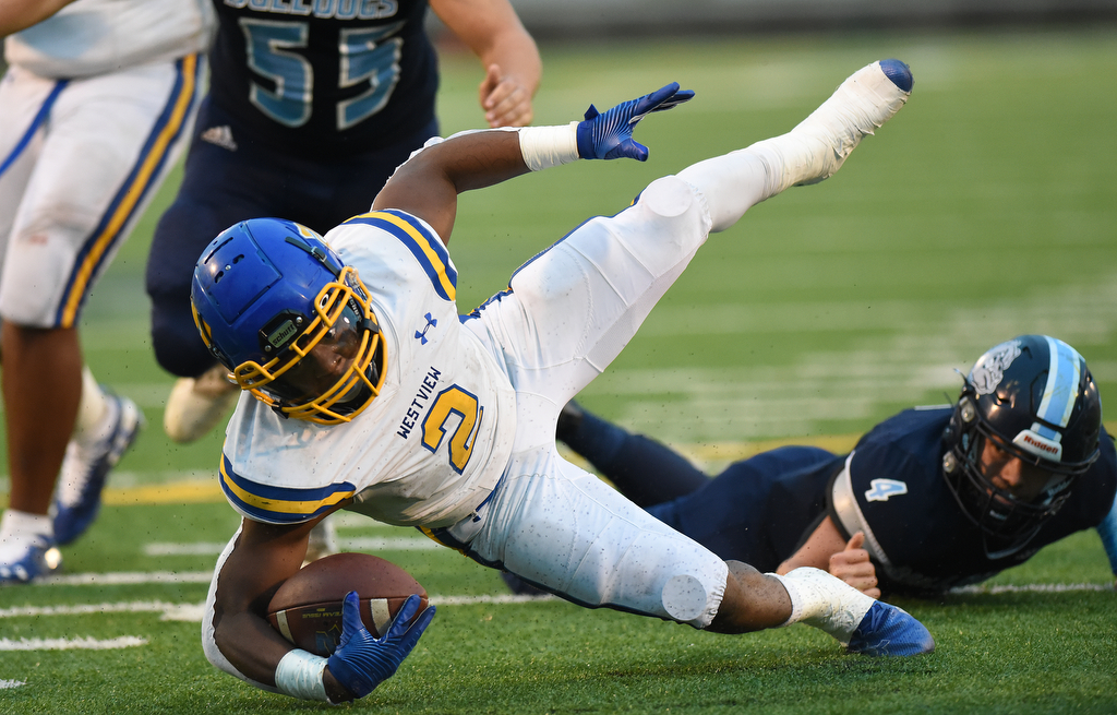 Staff Photo by Matt Hamilton / Westview High School (2) Javion Goins dives ahead for extra yards on Saturday, December 4, 2021 at Finley Stadium during the Class 2A championship game. Westview defeated Hampton 55-14 in the championship game.