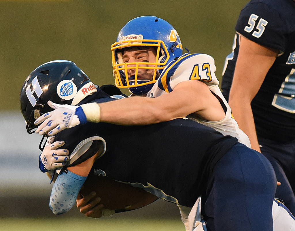 Staff Photo by Matt Hamilton / Westview High School (43) Jaden Johns wraps up Hampton High School (4) Conor Jones on Saturday, December 4, 2021 at Finley Stadium during the Class 2A championship game. Westview defeated Hampton 55-14 in the championship game.