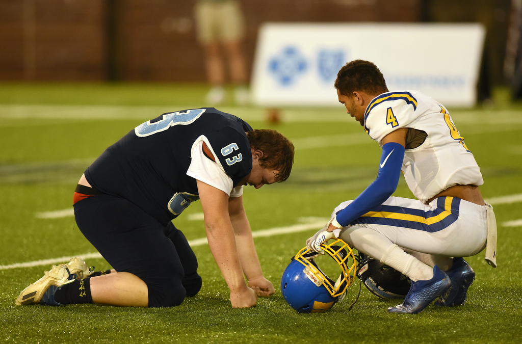 Staff Photo by Matt Hamilton / Westview High School (4) Eason Couch consoles Hampton High School (63) Zachary Beam after the game on Saturday, December 4, 2021 at Finley Stadium during the Class 2A championship game. Westview defeated Hampton 55-14 in the championship game.
