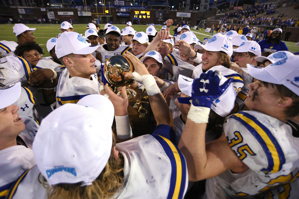Staff Photo by Matt Hamilton / Westview High School (6) Ty Simpson holds the championship trophy on Saturday, December 4, 2021 at Finley Stadium during the Class 2A championship game. Westview defeated Hampton 55-14 in the championship game.