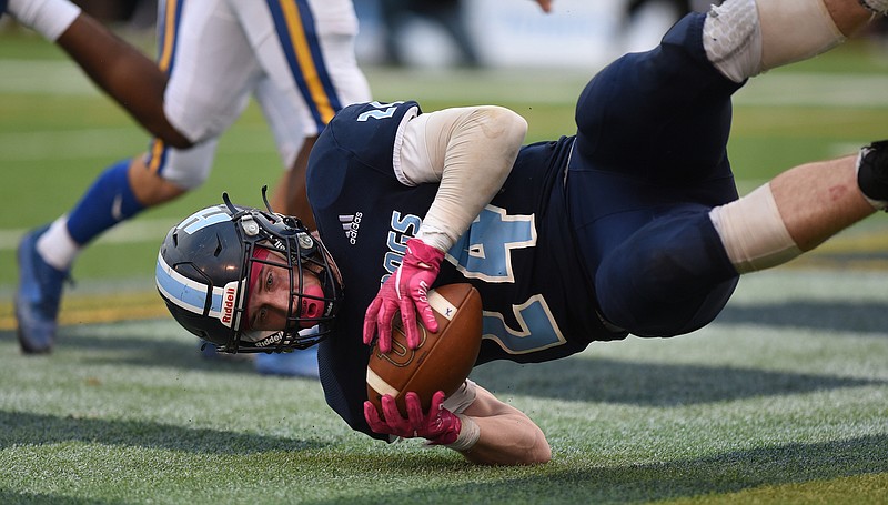 Staff Photo by Matt Hamilton / Hampton High School (24) Morgan Lyons hangs onto the ball for a score on Saturday, December 4, 2021 at Finley Stadium during the Class 2A  championship game. Westview defeated Hampton 55-14 in the championship game. 