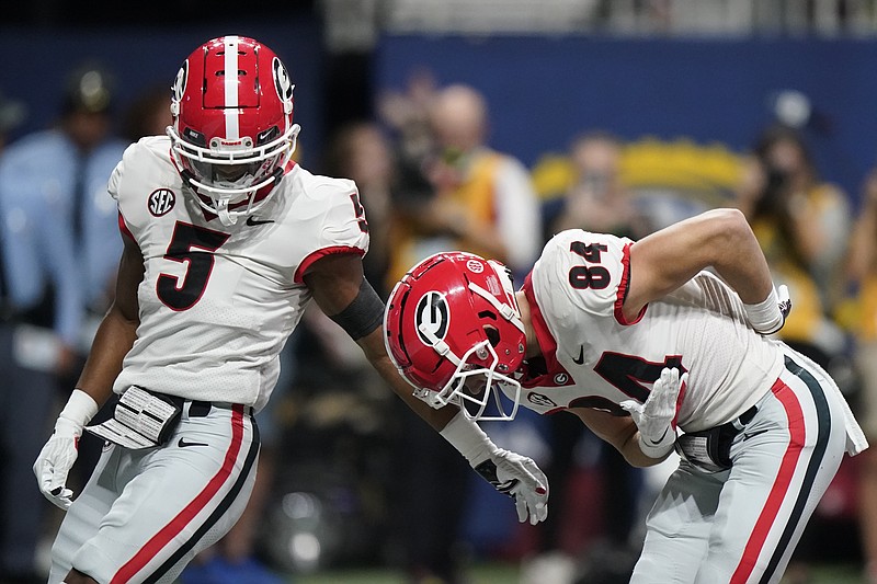 AP photo by Brynn Anderson / Georgia wide receiver Ladd McConkey takes a bow in the end zone after scoring a touchdown against Alabama in the SEC title game Saturday in Atlanta.