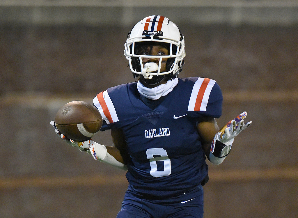 Staff Photo by Matt Hamilton / Oakland High School (8) Khalil James reacts after scoring a touchdown on Saturday, December 4, 2021 at Finley Stadium during the Class 6A championship game.