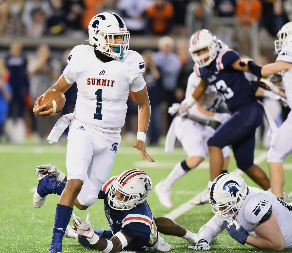 Staff Photo by Matt Hamilton / Summit High School (1) Destin Wade carries the ball on Saturday, December 4, 2021 at Finley Stadium during the Class 6A championship game.
