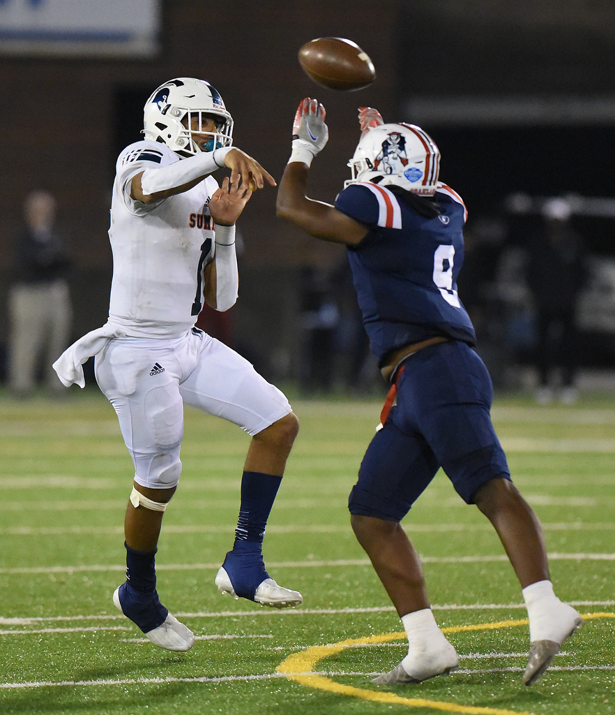 Staff Photo by Matt Hamilton / Oakland High School (9) Theron Gaines gets in the face of Summit High School (1) Destin Wade as he gets a pass off on Saturday, December 4, 2021 at Finley Stadium during the Class 6A championship game.