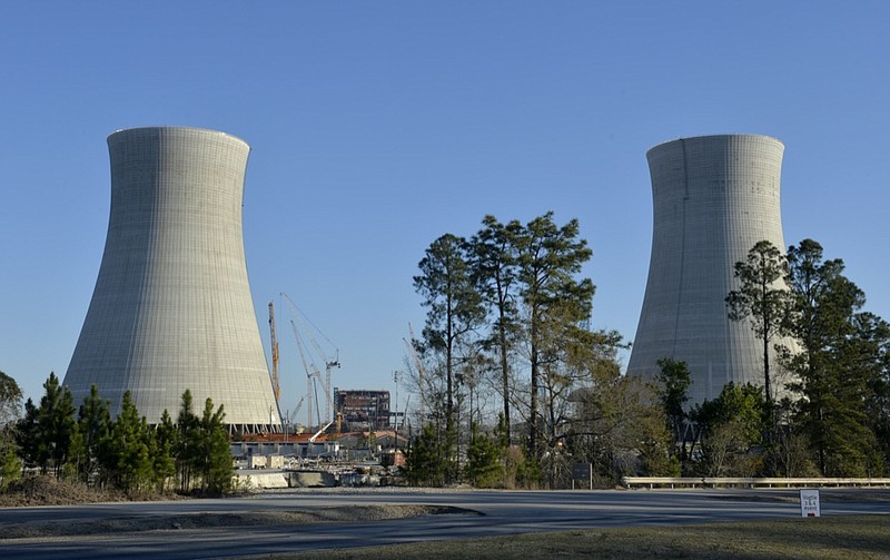 FILE - The cooling towers of the still under construction Plant Vogtle nuclear energy facility are seen, March 22, 2019 in Waynesboro, Ga. (Michael Holahan/The Augusta Chronicle via AP, File)


