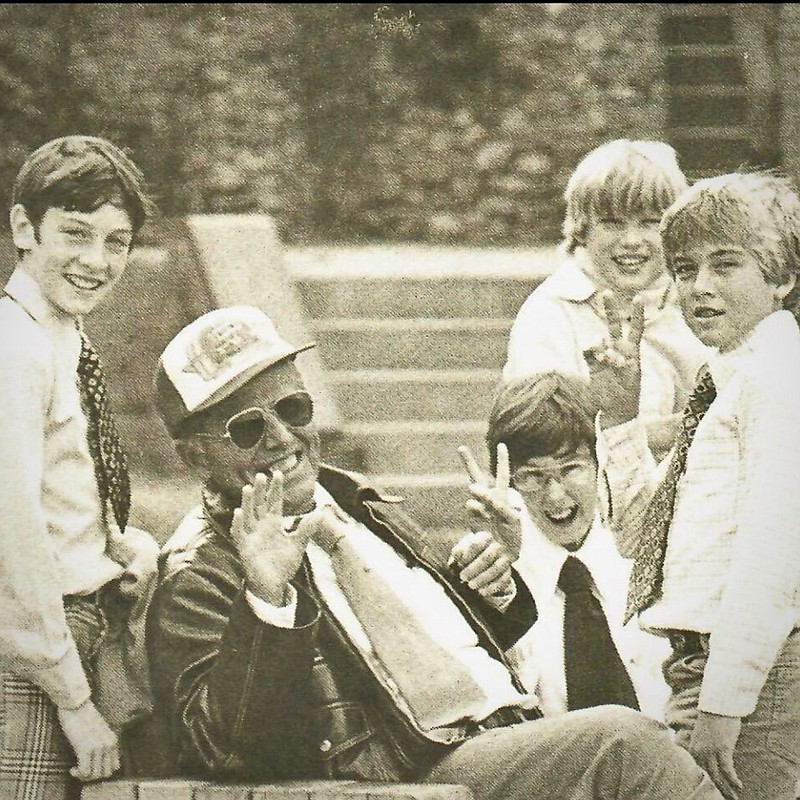 Contributed photo from McCallie School / John "Yo" Strang, shown here with McCallie School students, was a beloved Bible teacher and tennis coach at the school. Strang, who died in 2003, is the subject of a new podcast, "Yo: The Long Road Home."