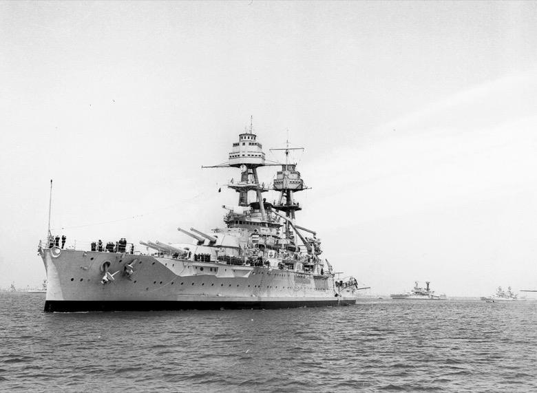 FILE - This April 1938 file photo shows the USS Oklahoma. The ship sank during the Dec. 7, 1941 attack on Pearl Harbor. Pearl Harbor survivors and World War II veterans are gathering in Hawaii this week to remember those killed in the Dec. 7, 1941 attack. Those attending will observe a moment of silence at 7:55 a.m., the minute the bombing began. The ceremony will mark the 80th anniversary of the attack that launched the U.S. into World War II. (AP Photo/File)