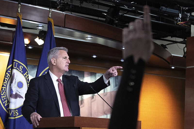 Photo by Tom Brenner of The New York Times / House Minority Leader Kevin McCarthy, R-Calif., takes questions from reporters during a news conference on Capitol Hill in Washington on Friday, Dec. 3, 2021.