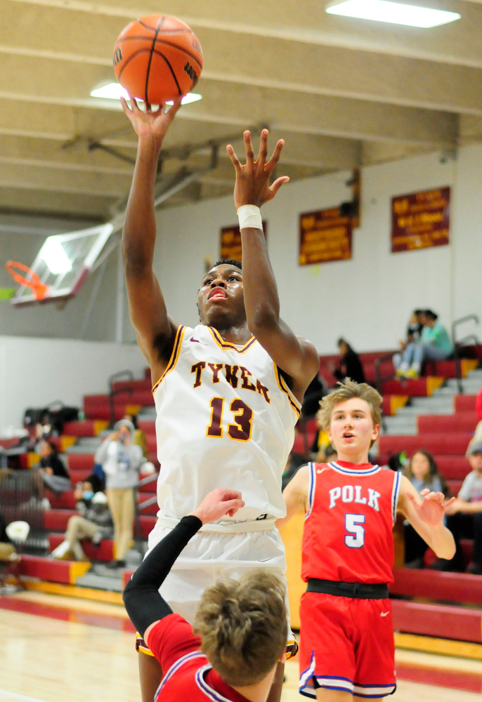 Staff Photo by Robin Rudd / Tyner's Keelan Patterson (13) shoots a jump shot. The Polk County Wildcats visited the Tyner Rams in TSSAA boy's basketball on December 7, 2021.