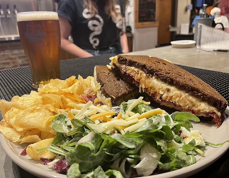 Photo by Anne Braly / Just the right amounts of fork-tender corned beef, Swiss cheese and sauerkraut make for a perfect Reuben sandwich at WanderLinger.