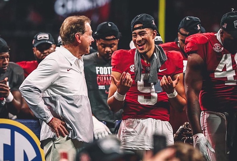 Crimson Tide photos / Alabama football coach Nick Saban and Crimson Tide sophomore quarterback Bryce Young share a laugh after last Saturday's 41-24 defeat of Georgia in the SEC championship game.
