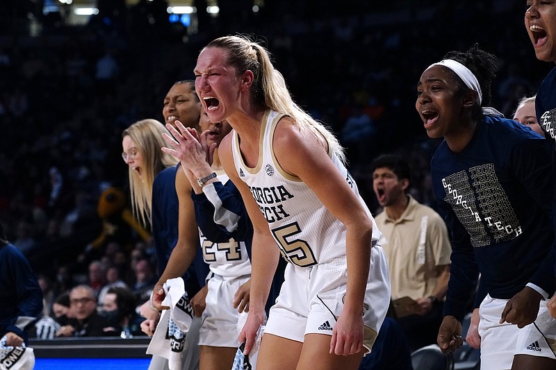 AP photo by John Bazemore / Georgia Tech forward Digna Strautmane (45) and her teammates react to a foul call during the first half of Thursday's win against No. 3 Connecticut in Atlanta.