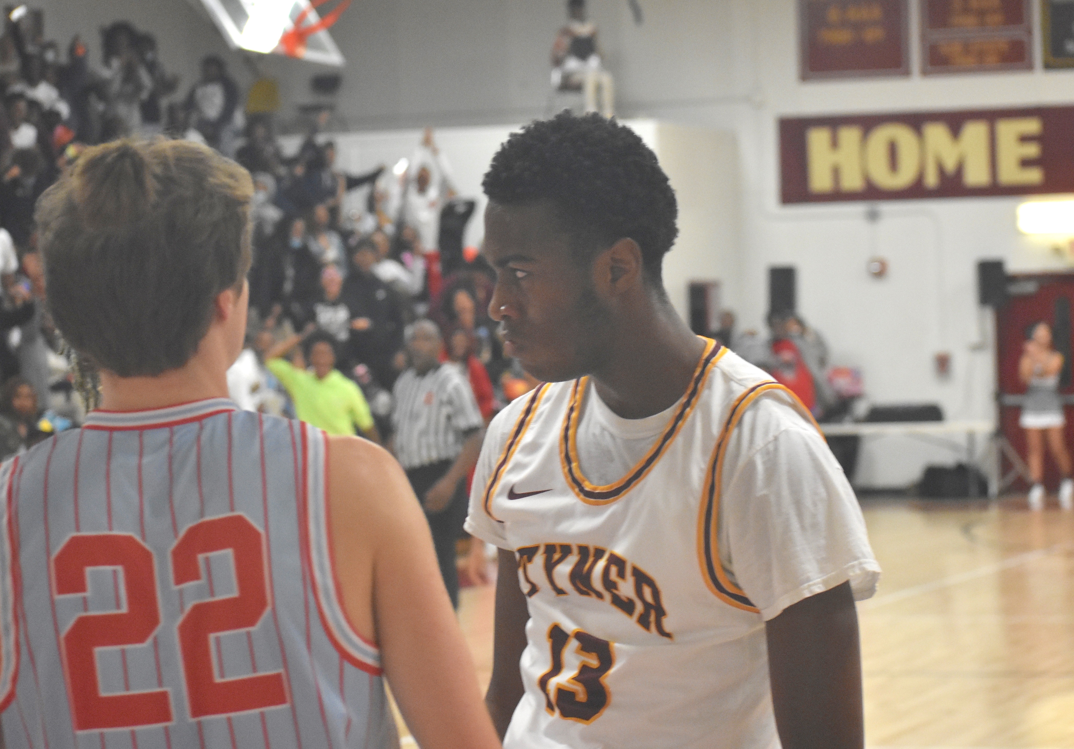 Staff photo by Patrick MacCoon / Tyner guard Keelan Jackson flexes after a putback jam against Brainerd on Friday night.