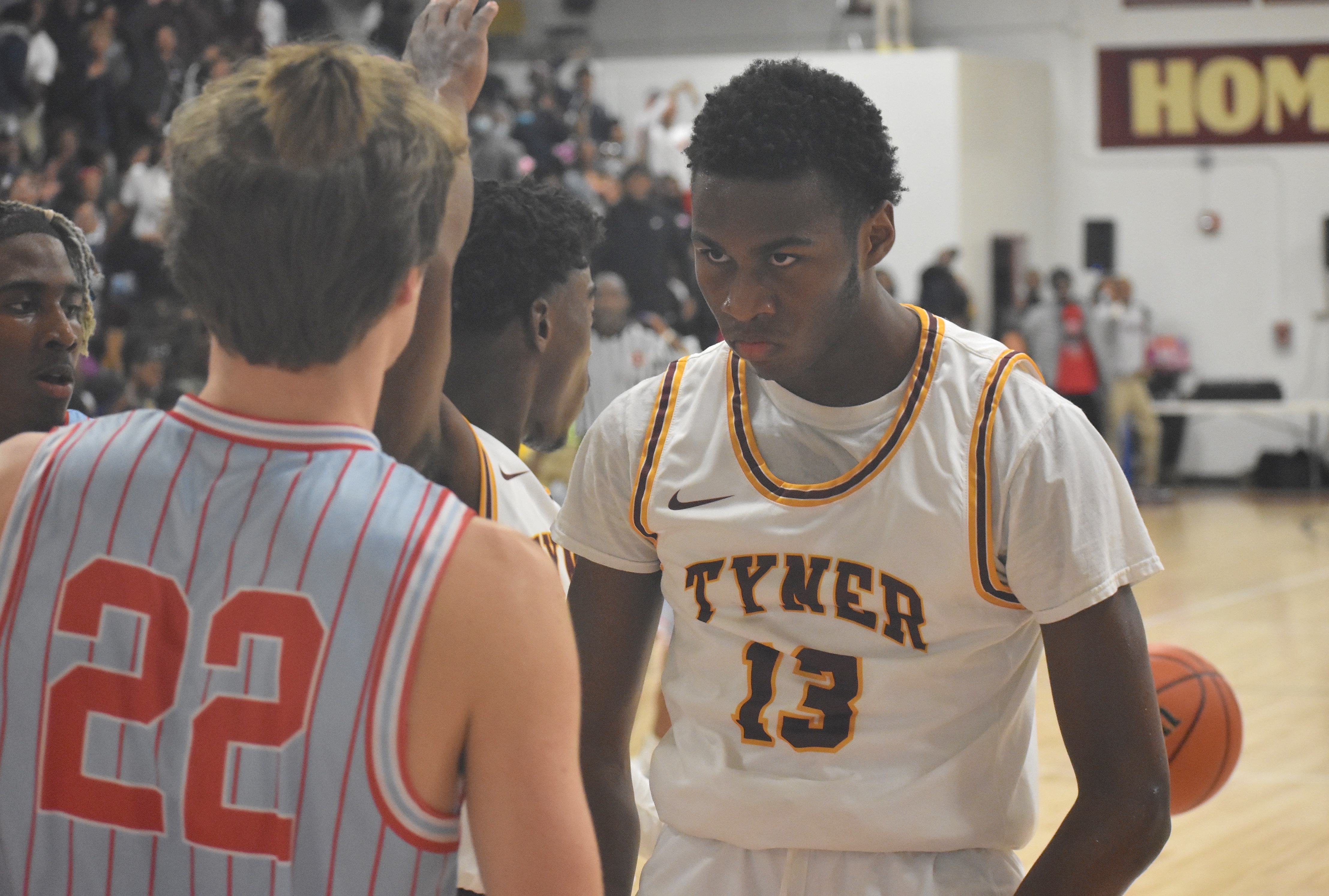 Staff photo by Patrick MacCoon / Tyner guard Keelan Jackson flexes after a putback jam against Brainerd on Friday night.